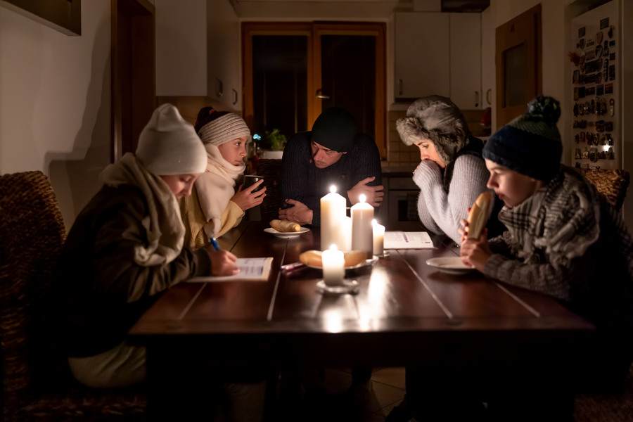 Family of five suffers in no heating and no electricity during an energy crisis in Europe causing blackouts.